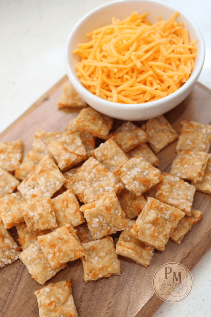 Sourdough Discard Cheese Crackers on a wooden cutting board