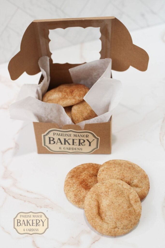 cookies in a stack with a box of cookies in the background