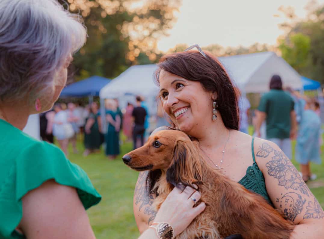 Lynsey holding a dachshund at Pauline Manor