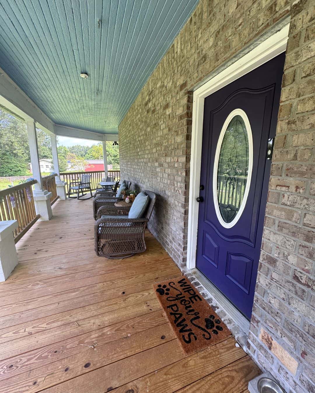 The wraparound porch and front entrance of Pauline Manor
